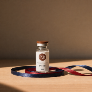 Pürveyor PT-141 10MG US Lyophilized vial on warm ribbon background
